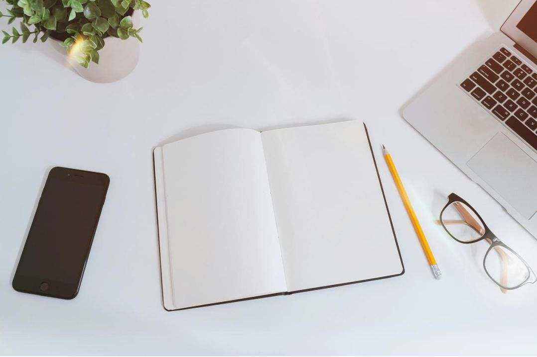 Selection of notebooks and pens